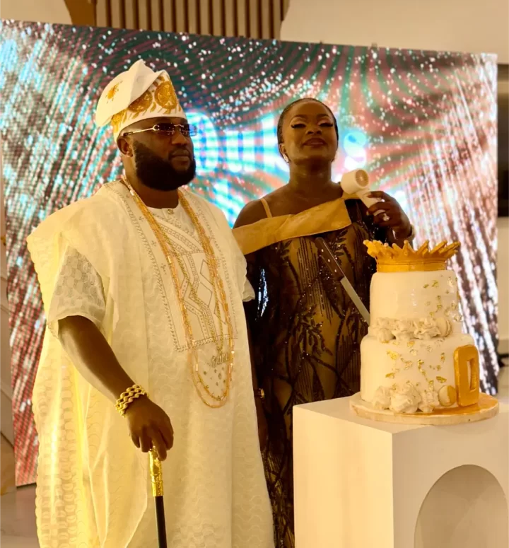 husband and wife with a cake