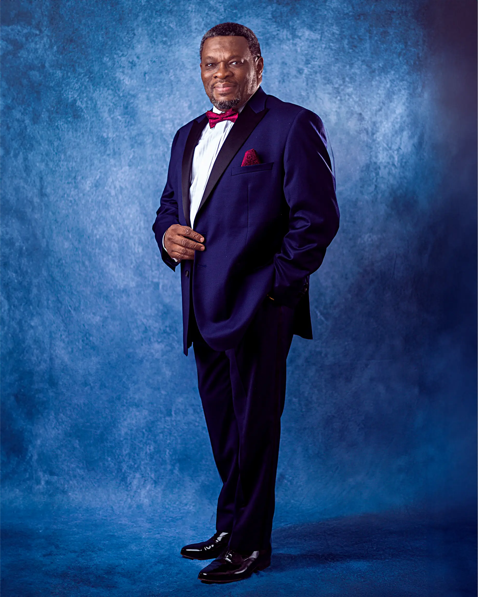 african man in blue suit